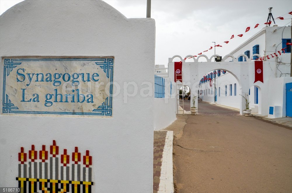 The Synagogue ''La Ghriba'' in Djerba, Tunisia May 8, 2023: Tunis, Tunisia. 08 May 2022. The ancient synagogue ''La Ghriba'' in the Tunisian island of Djerba. The synagogue is an important feature for the Jewish community on the Tunisian island of Djerba, while also being a major site of pilgrimage