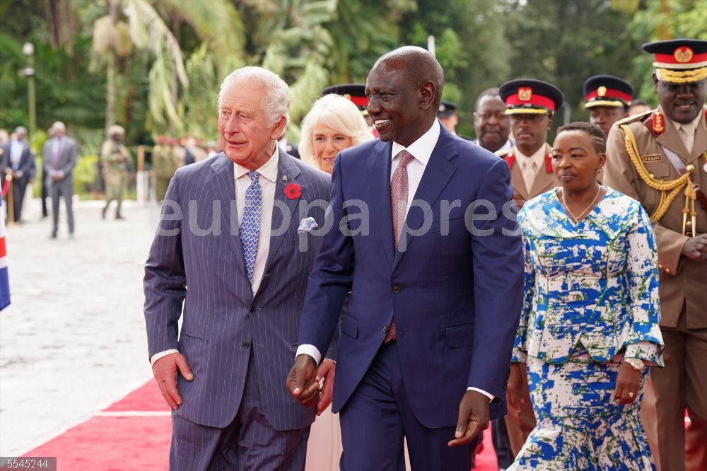 British Royal visit to Kenya 31 October 2023, Kenya, Nairobi: King Charles III (L) and Queen Camilla (2nd L) are welcomed by the President of Kenya Dr William Ruto (C) and the First Lady Rachel Ruto (R) as they arrive at the State House in Nairobi on day one of the State Visit to Kenya. Photo: Arthur Edwards/The Sun/PA Wire/dpa