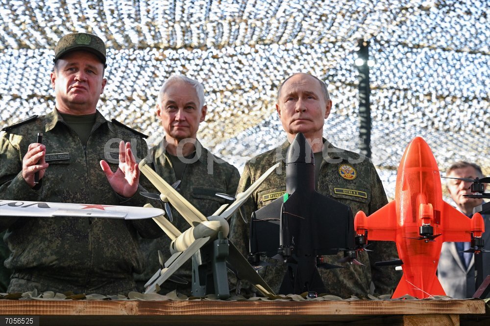 Russia'S President Putin On Working Trip To Volga Federal District RUSSIA, NIZHNY NOVGOROD REGION - SEPTEMBER 16, 2025: Commander-in-Chief of Russian Army Ground Troops Andrei Mordvichev, Russia's Defence Minister Andrei Belousov and Russia's President Vladimir Putin (L-R front) inspect armaments, military hardware and special military hardware at the Mulino military training range